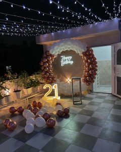 Terrace Birthday Setup with Neon & Arch Decor